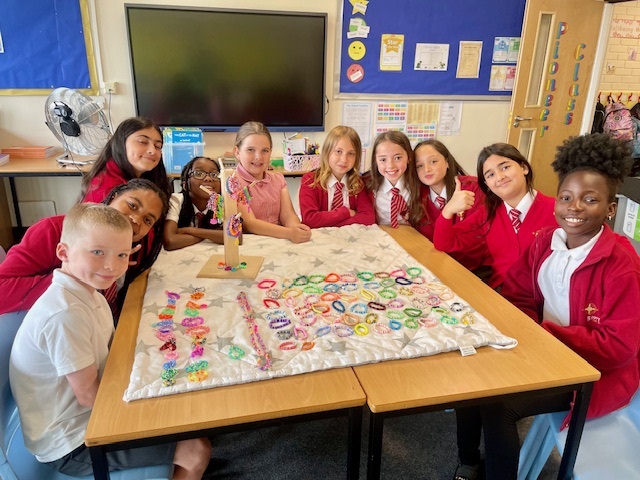 School children displaying their products to sell as part of business club